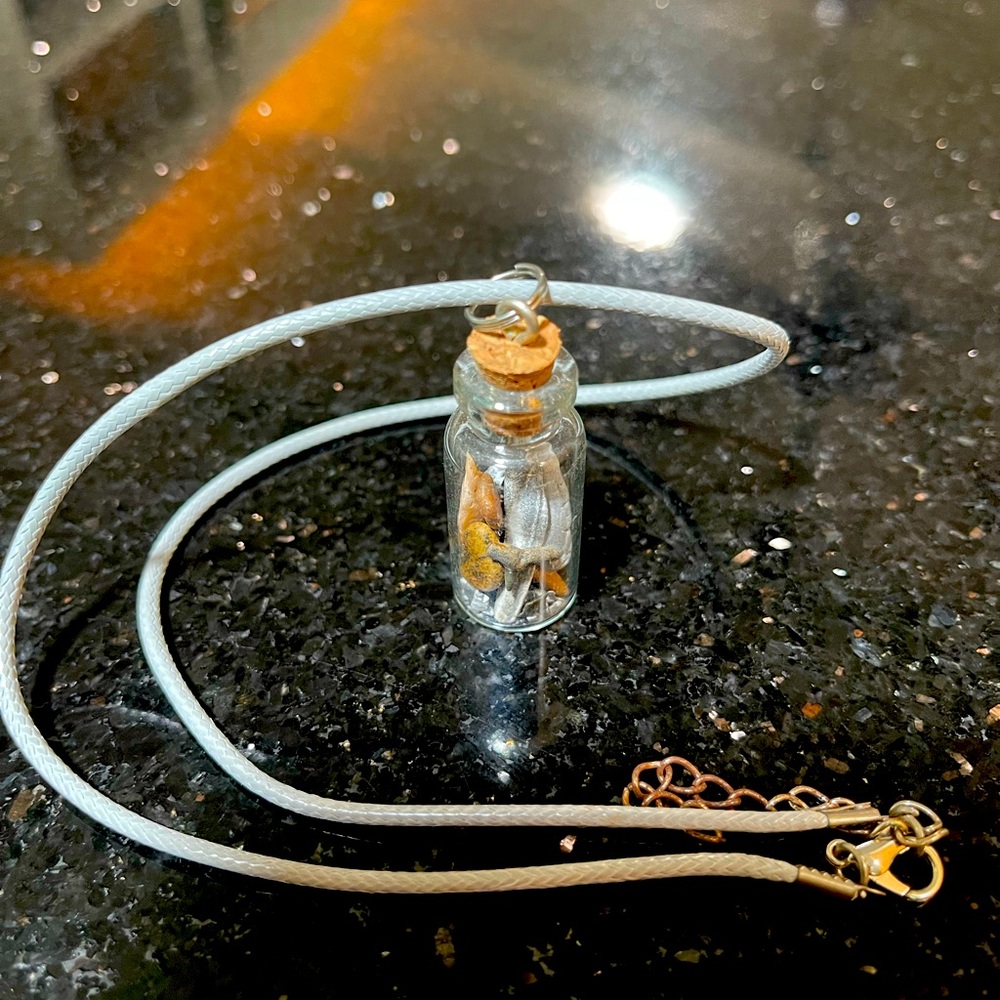 One of a kind handmade beach necklace- this one contains shark teeth.